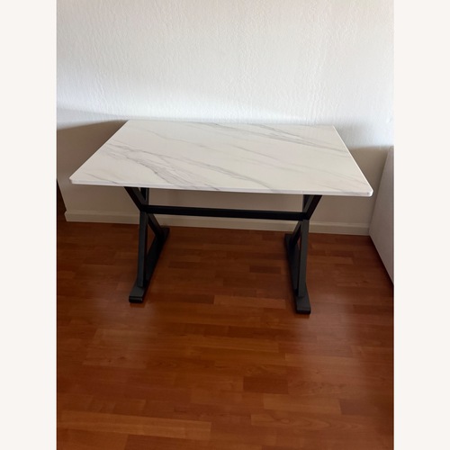 Used Amazon White Marble Dining Table for sale on AptDeco
