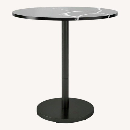 Used West Elm Orbit Restaurant Dining Table for sale on AptDeco