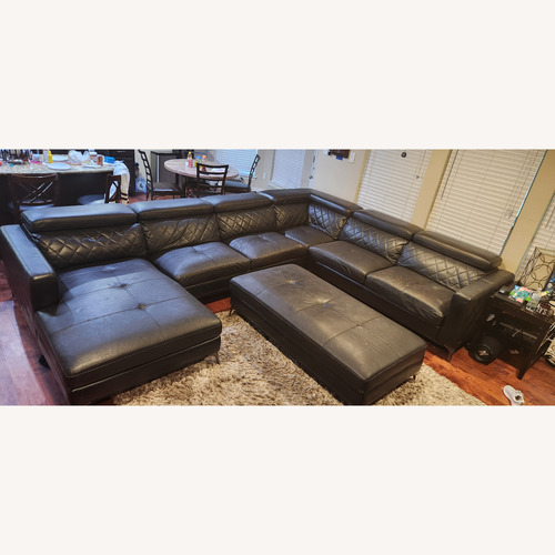 Used Black Vinyl 3+ Piece Sectional for sale on AptDeco
