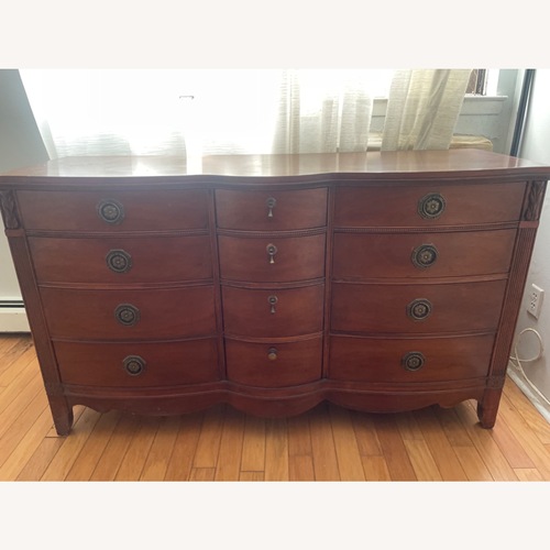 Used Vintage/Antique Finds Dark Brown Wood Dresser for sale on AptDeco