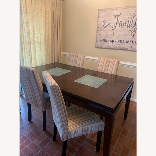 Used Rooms To Go  Dark Brown Wood Dining Sets for sale on AptDeco