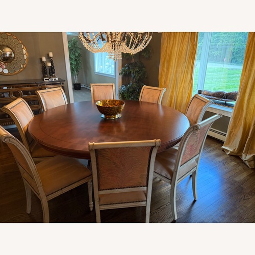 Used Dark wood 72” Round Table for sale on AptDeco