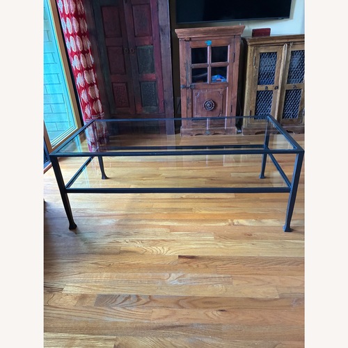 Used Pottery Barn Tanner 48”Glass & Iron Coffee Table for sale on AptDeco