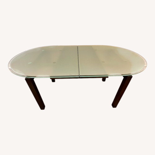 Used Calligaris Glass Dining Set with 6 Chairs for sale on AptDeco