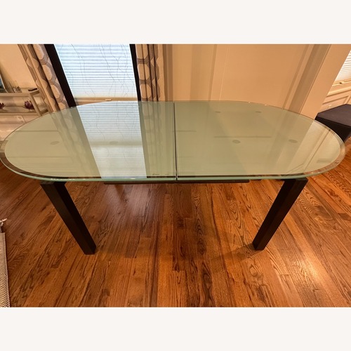Used Calligaris Glass Dining Set with 6 Chairs for sale on AptDeco