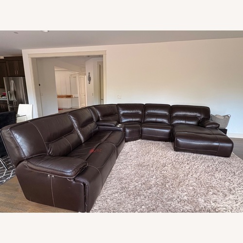 Used Macy's Dark Brown Leather 3+ Piece Sectional for sale on AptDeco