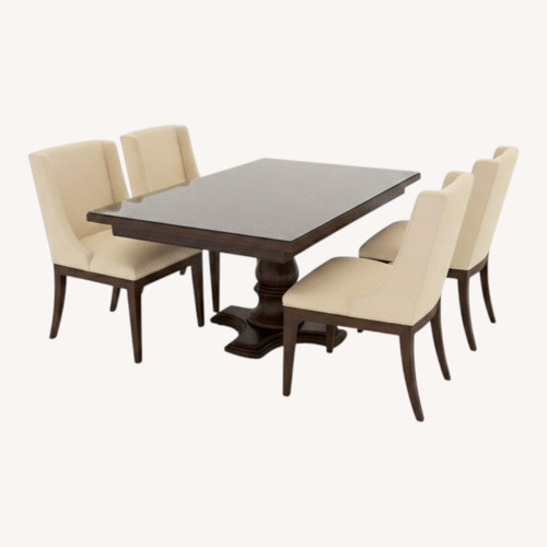Used Dark Brown Wood Dining Table for sale on AptDeco