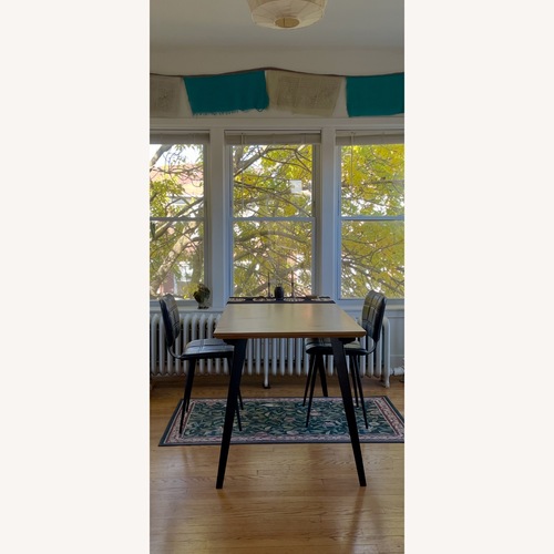 Used Floyd Natural Wood Dining Table for sale on AptDeco