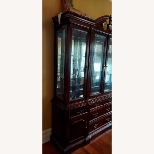 Used Dark Brown Wood Wall Unit for sale on AptDeco