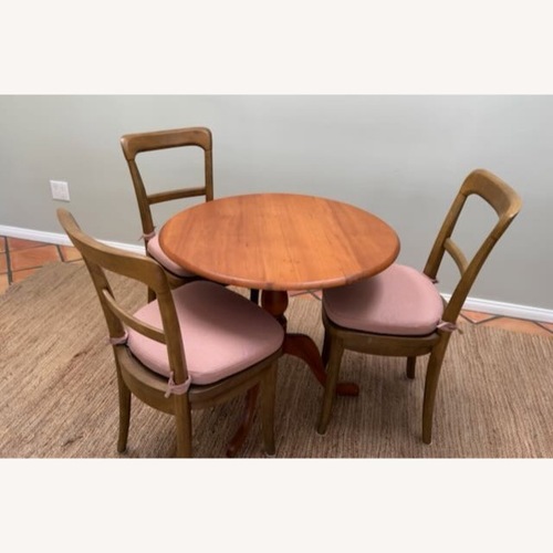 Used Vintage Queen Anne Tilt Table and Dining Chairs for sale on AptDeco