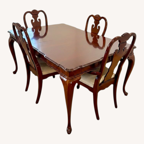 Used Dark Brown Wood Dining Set for sale on AptDeco
