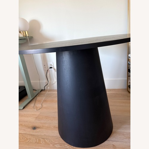 Used Modern Round Pedestal Dining Table for sale on AptDeco