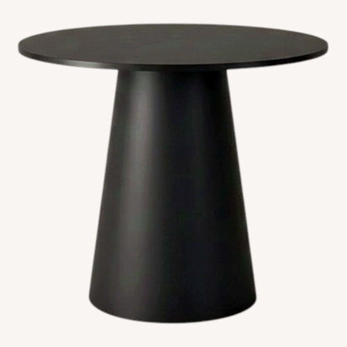 Used Modern Round Pedestal Dining Table for sale on AptDeco