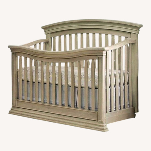 Used Light Brown Wood Crib for sale on AptDeco