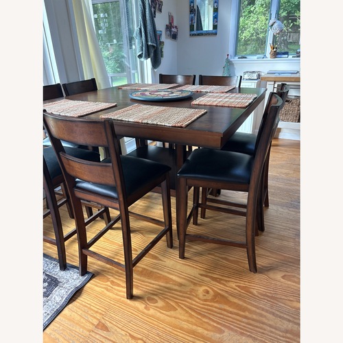 Used Tall Dining Room Table with 8 Chairs for sale on AptDeco