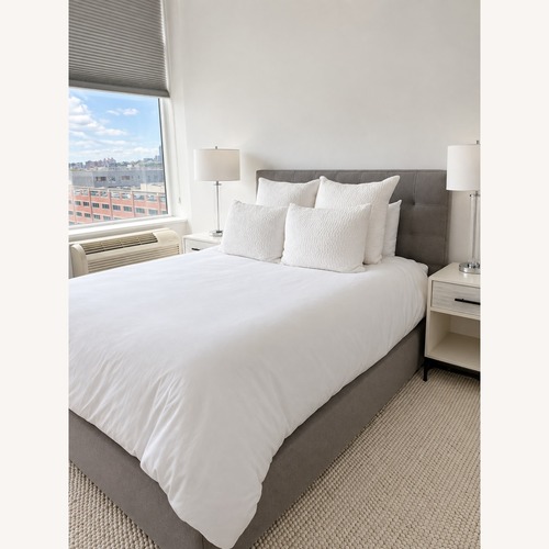 Used Room & Board Avery Light Gray Queen Bed with Storage for sale on AptDeco