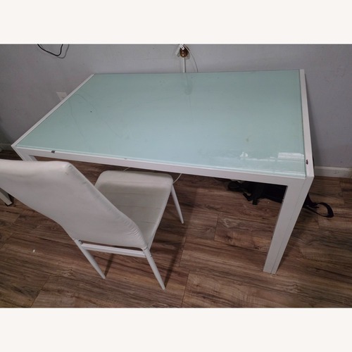 Used White Glass Dining Table for sale on AptDeco