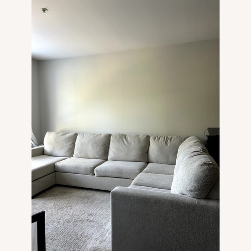 Used Ashley Furniture 3+ Piece Sectional (Color: Linen) for sale on AptDeco