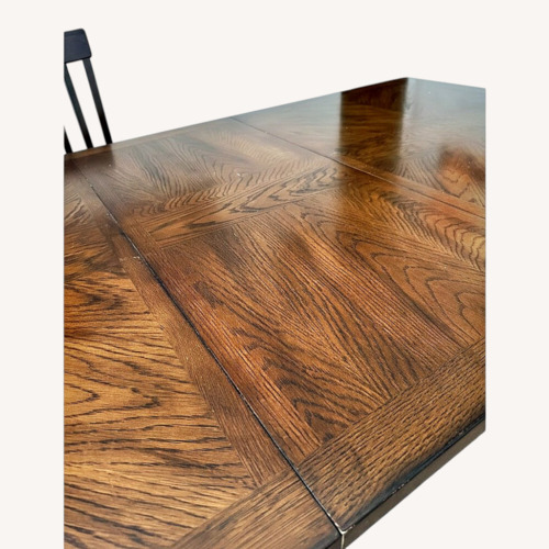 Used Dark Brown Wood Dining Table & Two Leaves for sale on AptDeco