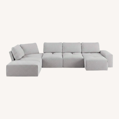 Used Rooms To Go Sofa with a Chaise and Corner Part for sale on AptDeco