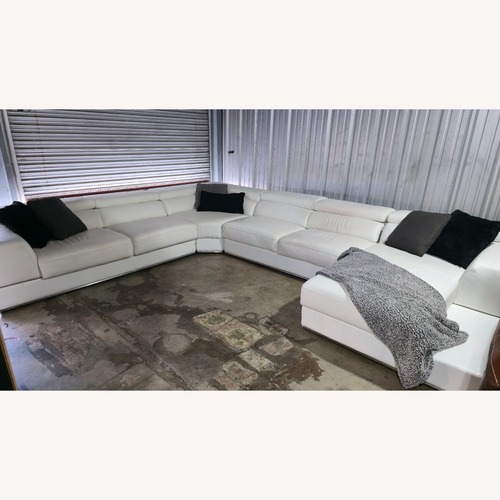 Used White Leather 3+ Piece Sectional for sale on AptDeco