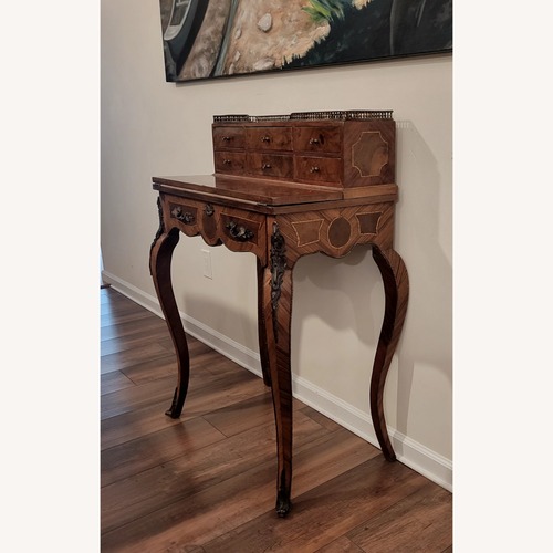 Used Vintage/Antique Dark Brown Wood Desk for sale on AptDeco