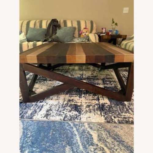 Used Rooms To Go Westover Hills II Wood Coffee Table for sale on AptDeco