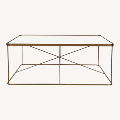 Used Pottery Barn Dark Brown Glass Coffee Table for sale on AptDeco