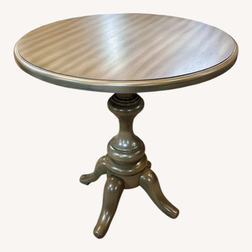 Used Round Wood Accent Table for sale on AptDeco