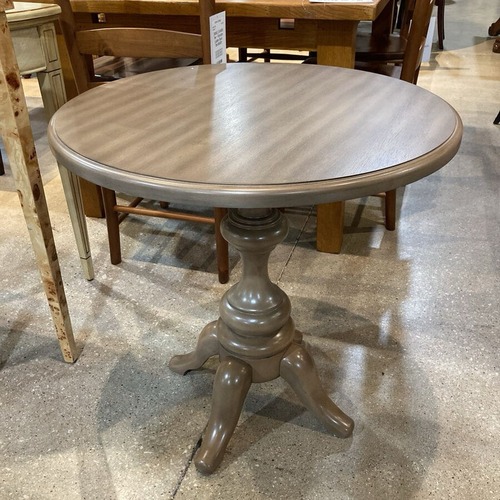 Used Round Wood Accent Table for sale on AptDeco