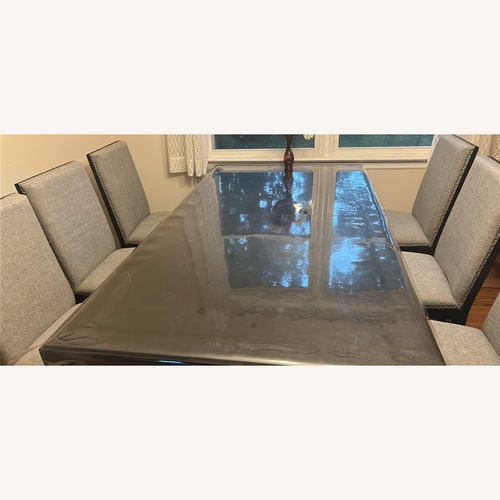 Used Expandable Table With 6 Chairs for sale on AptDeco