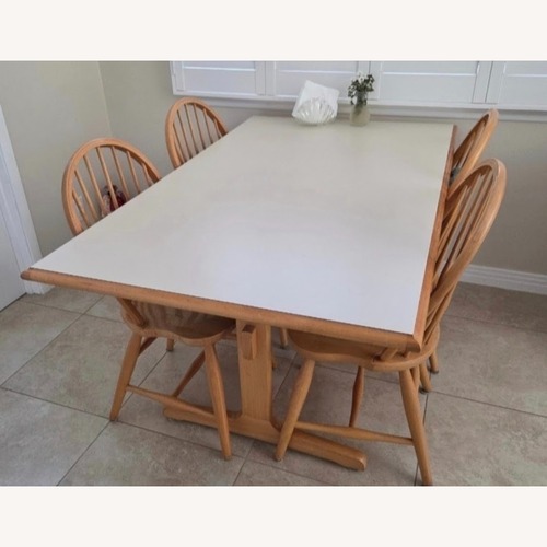 Used Natural Wood Dining Set for sale on AptDeco