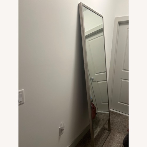 Used Room & Board Silver Stainless Steel Floor Mirror for sale on AptDeco