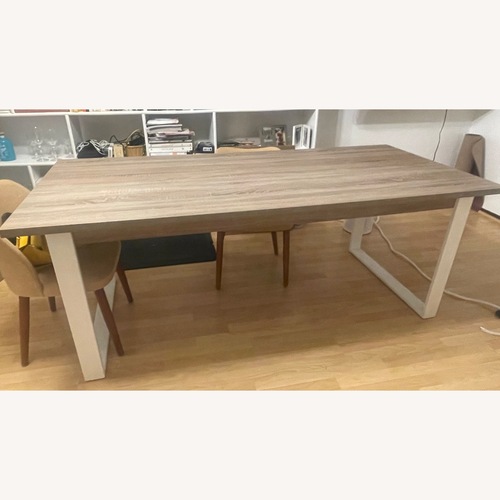 Used Scandinavian Designs Natural Wood Dining Table for sale on AptDeco