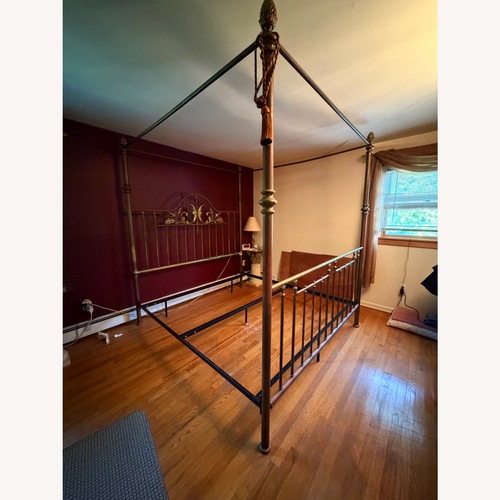 Used Charles P. Rogers Dark Brown Metal King Bed for sale on AptDeco