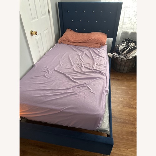 Used Royal Blue Twin Bed for sale on AptDeco