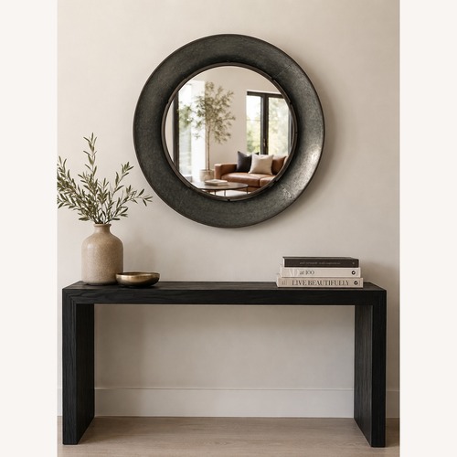 Used Modern Industrial Round Metal Wall Mirror for sale on AptDeco