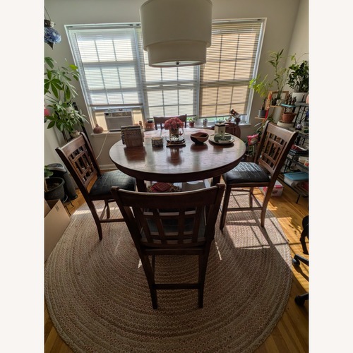 Used Counter Height Dining Set with 4 Chairs for sale on AptDeco