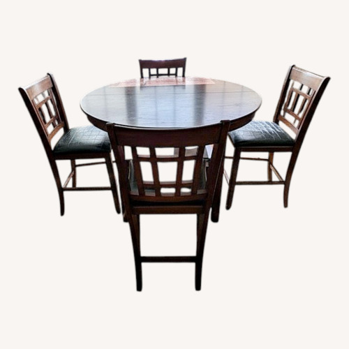 Used Counter Height Dining Set with 4 Chairs for sale on AptDeco