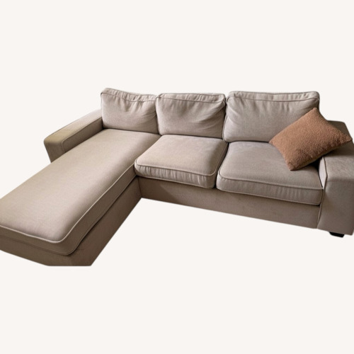 Used L Shaped Couch With Storage Space  for sale on AptDeco