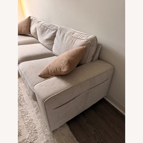 Used L Shaped Couch With Storage Space  for sale on AptDeco