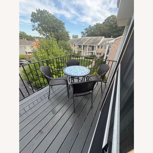 Used Patio Furniture Table Set With 4 Matching Chairs for sale on AptDeco