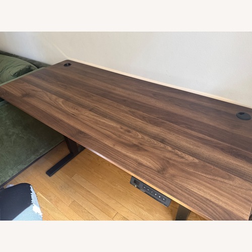 Used Haptic 55" Height Adjustable Desk - Walnut for sale on AptDeco