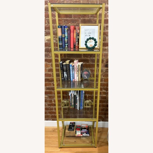Used Glass Storage Bookshelf with Matte Gold Frame for sale on AptDeco