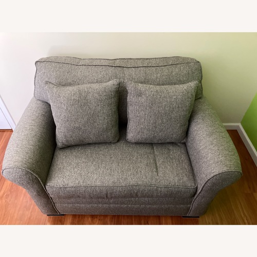 Used Rooms To Go Cindy Crawford Light Gray Fabric Sleeper Sofa for sale on AptDeco