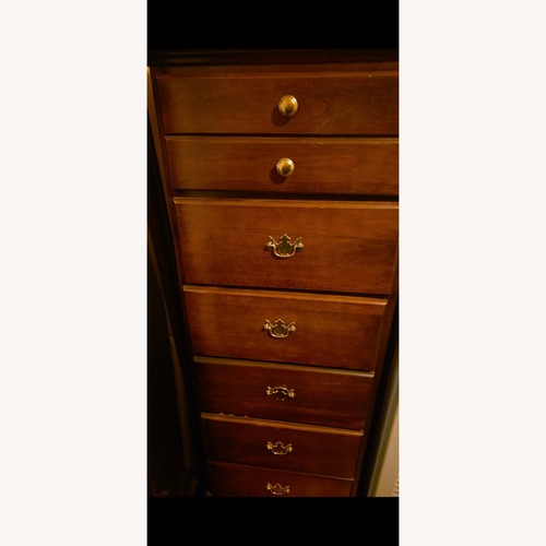 Used Vintage/Antique Dark Brown Wood Dresser for sale on AptDeco