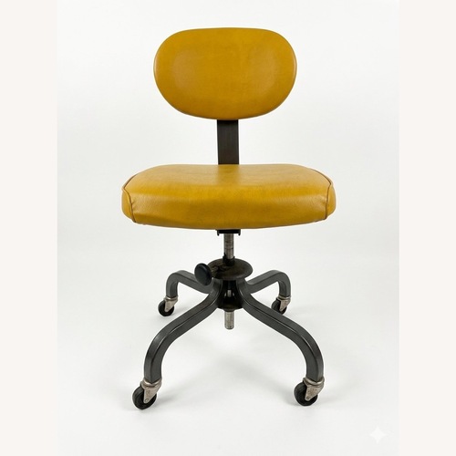 Used Vintage Mustard Yellow Vinyl Office Chair for sale on AptDeco