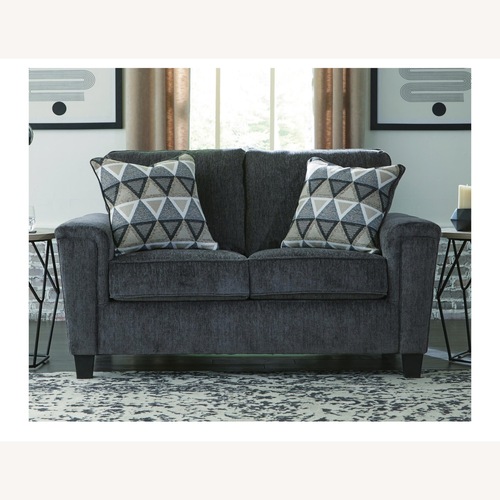 Used Ashley Furniture Altari Dark Gray Loveseat for sale on AptDeco