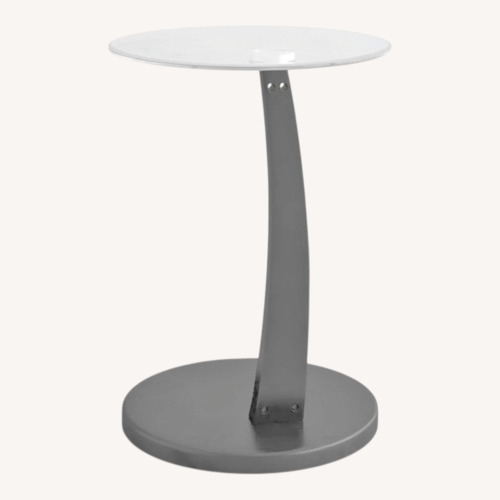 Used Two Round Bachmann Tempered Glass End Tables for sale on AptDeco