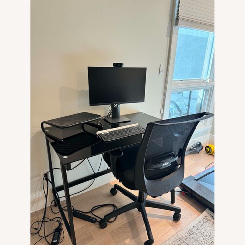 Used Compact Black Glass Desk for sale on AptDeco